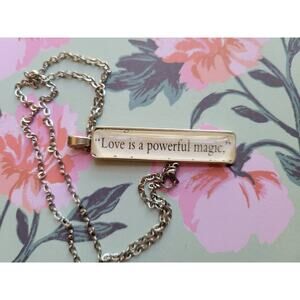 Love is a Powerful Magic necklace made from Small Town Big Magic book pages